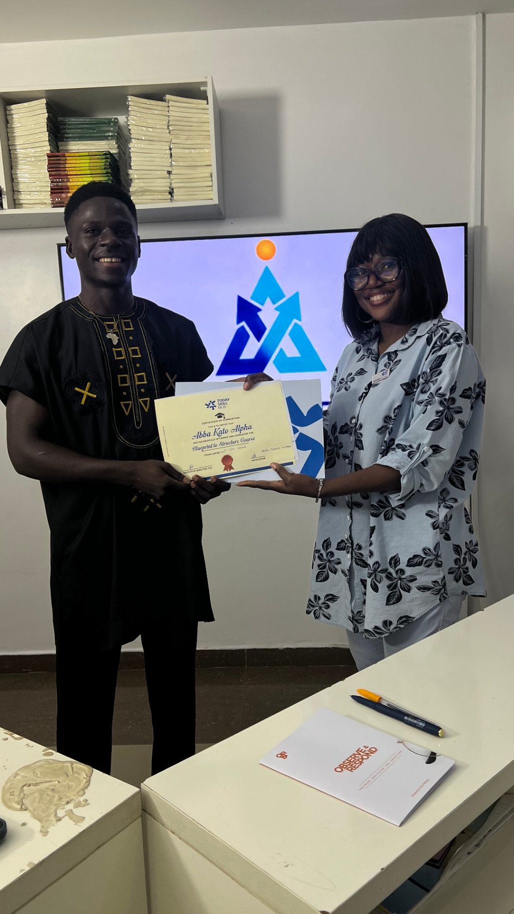Abba Kato Alpha receiving Blueprint to Structure certificate